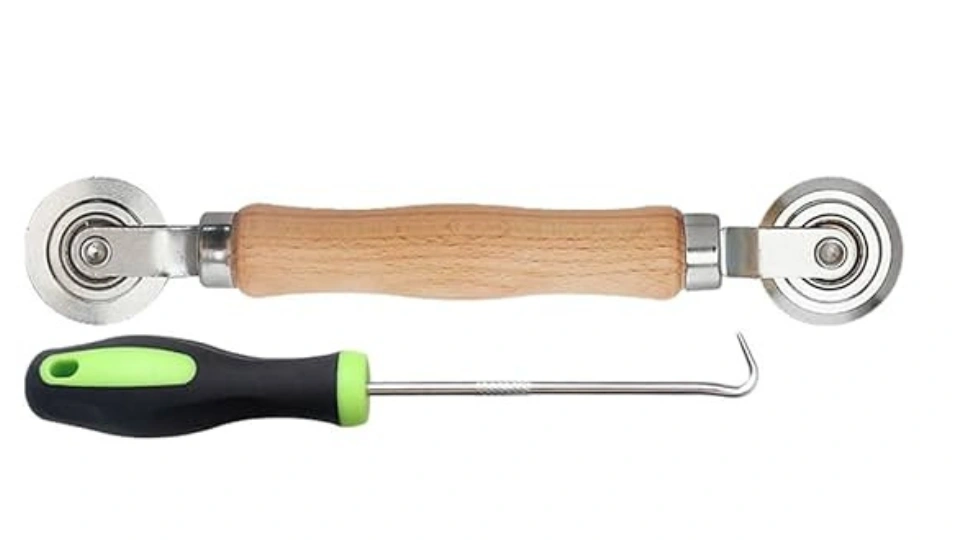 A technician's hands skillfully using a spline tool to perform a precise window screen repair, showcasing the company's expertise.