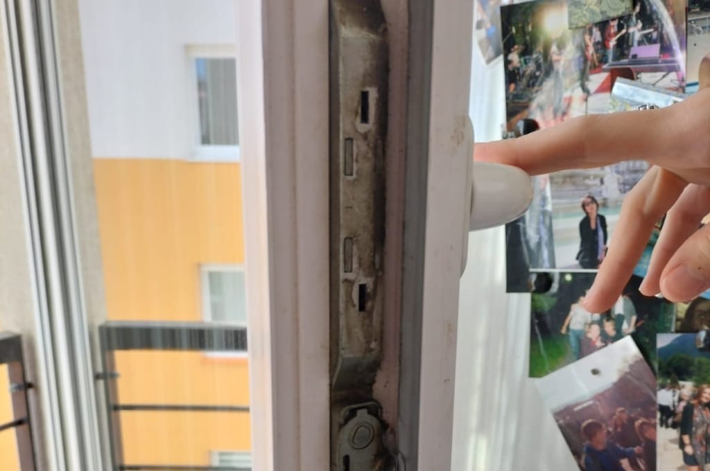 Local Austin door repair technician shaking hands with a homeowner outside a suburban house