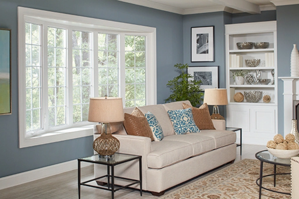 A happy Corpus Christi homeowner enjoying a cooler home after a window seal repair improved insulation.