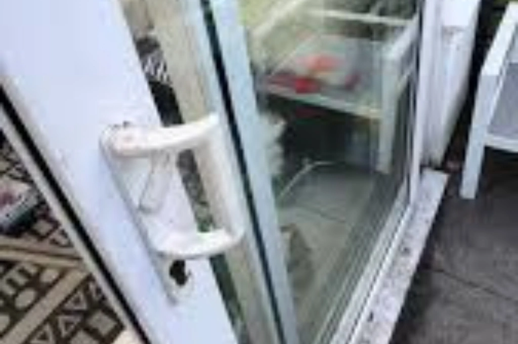 Before and after a complete sliding glass door repair and door jamb repair in a Garland home, demonstrating enhanced security and functionality by Windows And Doors Repair LLC.