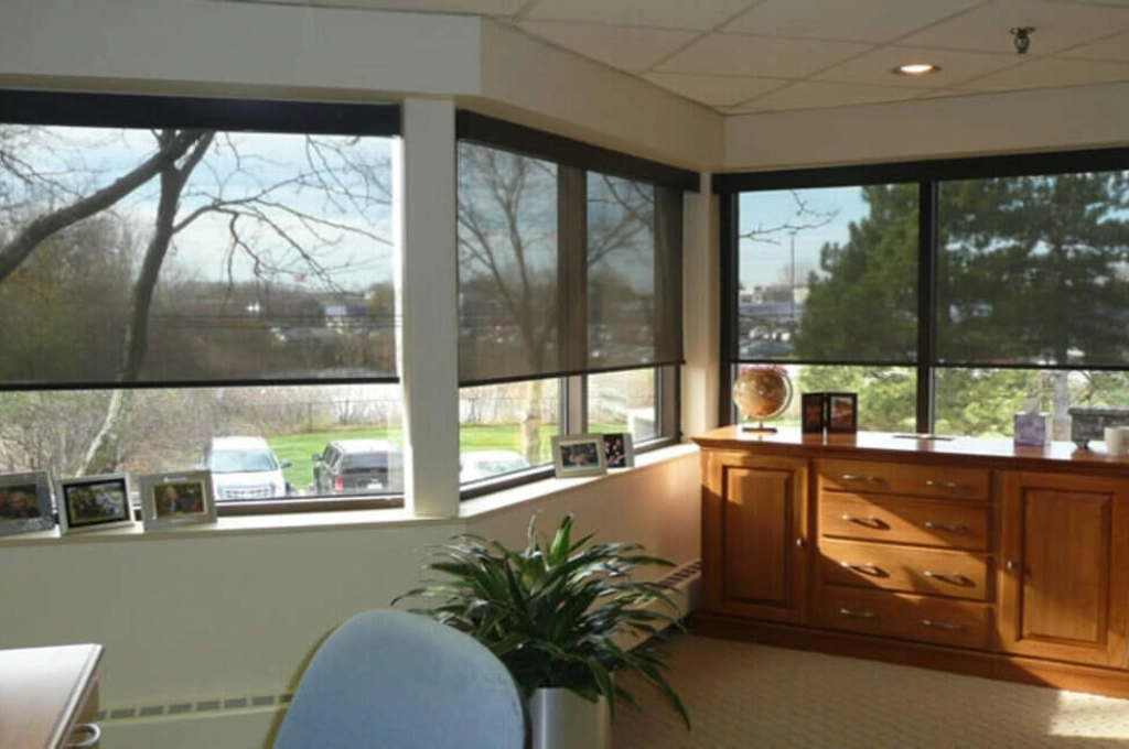 Energy-efficient solar screens installed on windows in an Allen, TX home to reduce heat and glare, by Windows And Doors Repair LLC.