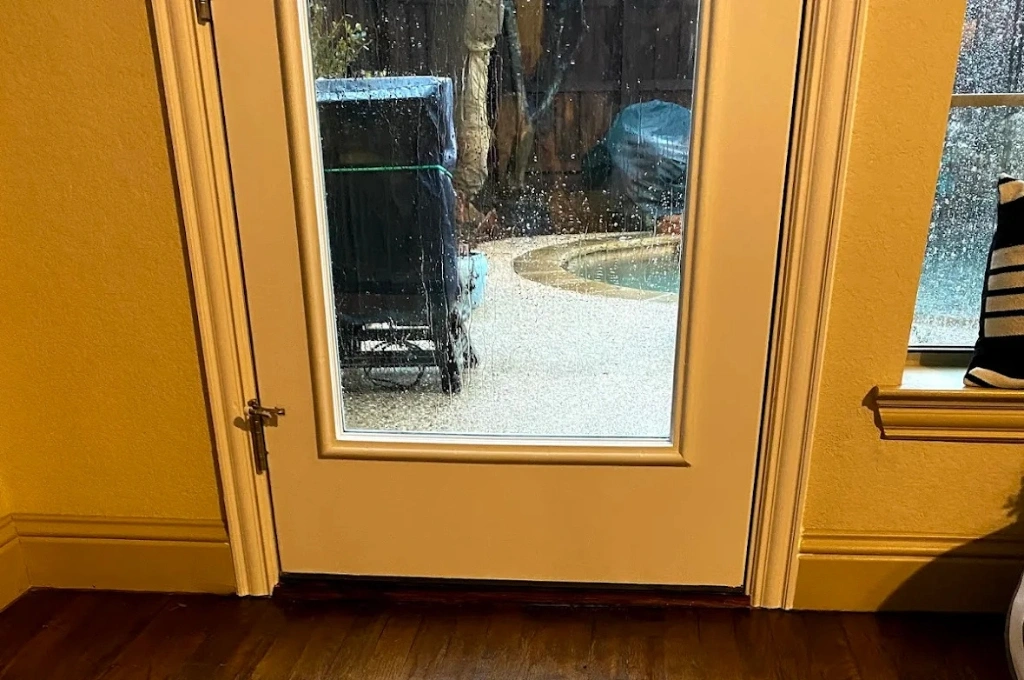 The same Arlington window looking crystal clear after our expert foggy window repair.