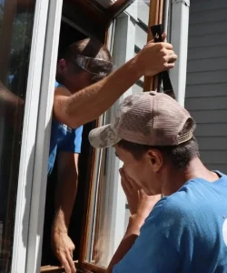A certified technician performing an expert window repair inspection in Corpus Christi, TX.