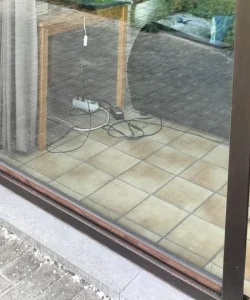 A close-up of a perfectly aligned, smoothly gliding door.