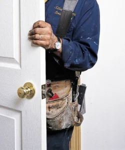 A commercial glass entry door in an El Paso storefront, perfectly repaired and functioning smoothly.