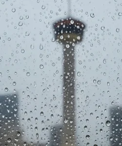 A foggy residential window in San Antonio before a professional window seal repair service.