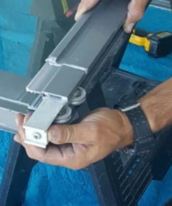 A perfectly aligned sliding glass door gliding effortlessly with one hand after a successful repair by Windows And Doors Repair LLC.