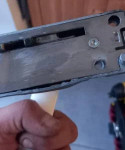 Close-up of a perfectly aligned and secured commercial door lock, showcasing our quality craftsmanship.