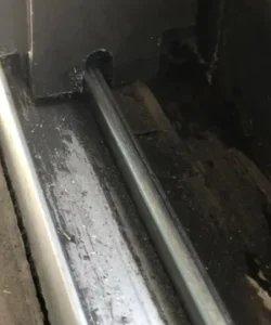 Worn-out sliding door rollers in need of replacement, a common repair in Plano.